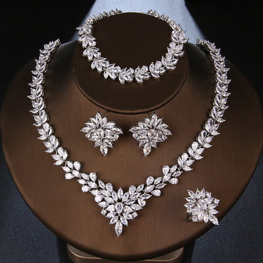 The Dazzling Set Is Handcrafted With Copper And Set With Zircon Stones.